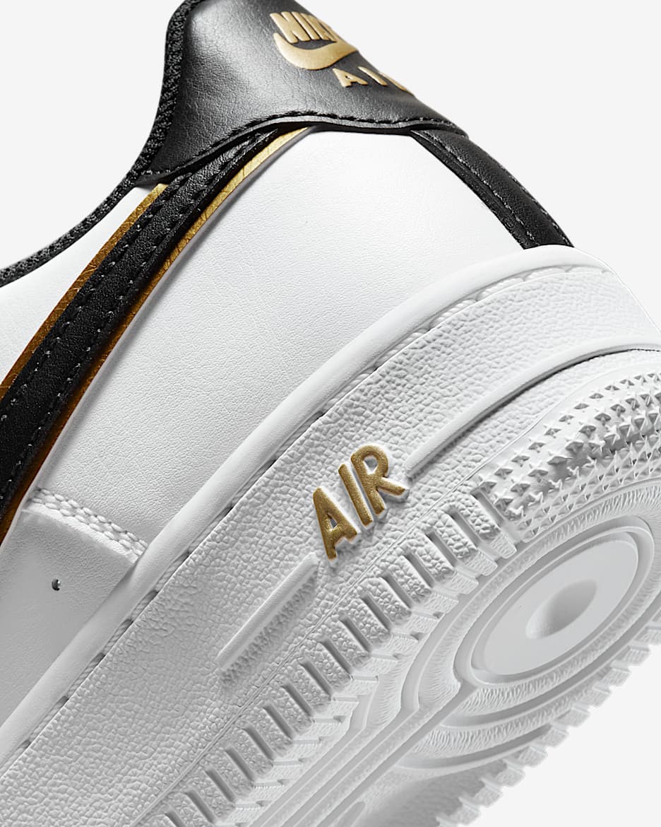 Air force 1 junior black and gold online